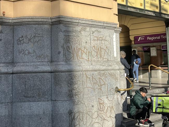 Graffiti tags near the front of Flinders Street Station that are yet to be removed. Picture: Supplied