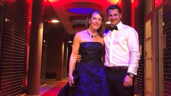 Conwoman Melissa Caddick wearing the iconic dress with her husband Anthony Koletti. Picture: Facebook