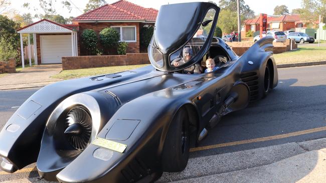 Finn O'Donovan in the Batmobile.