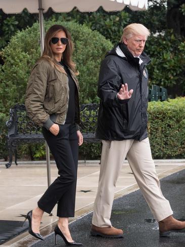 AUGUST 29: Leaving the White House with the President to view the damage caused by Hurricane Harvey, Melania might have expected positive reactions. But it was her decision to team her bomber jacket with sky-high heels that drew attention - and a backlash on social media. (She later changed into sneakers for her arrival in Texas.) Picture: AFP