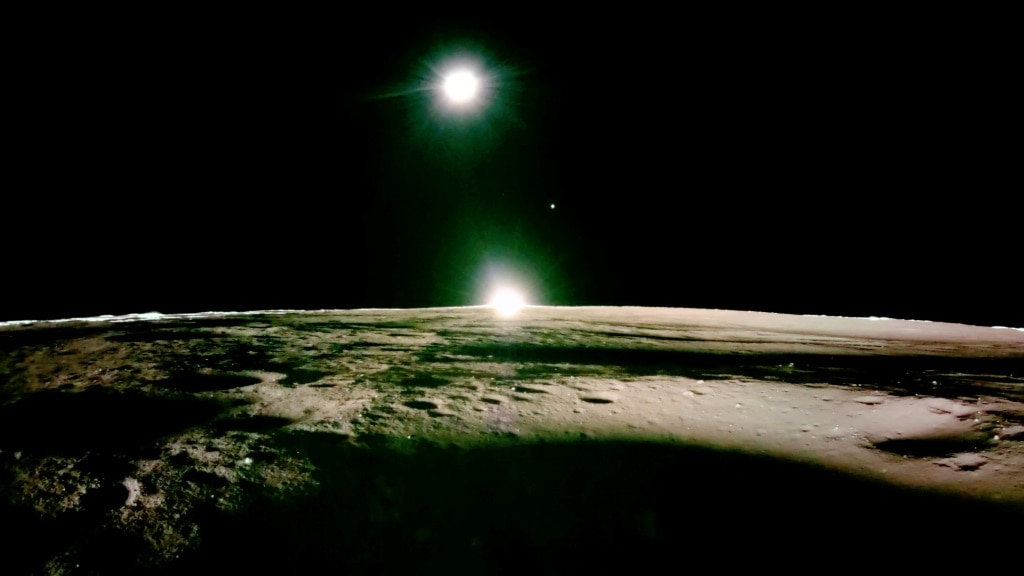 This handout photograph taken by Firefly Aerospace on March 16, 2025 and released on March 18, shows the lunar surface and the setting sun with Earth and Venus on the horizon, during the lunar mission of Firefly's Blue Ghost lunar lander