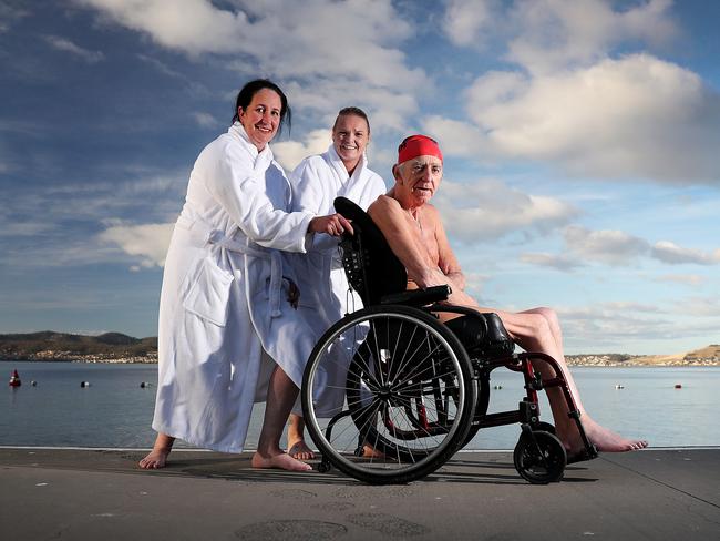 Graeme Mineall, 74, of Launceston, with Masonic Care Tasmania support staff Angie Cassidy, left, and Sarah Franks getting ready for the Nude Swim on Friday. Picture: SAM ROSEWARNE