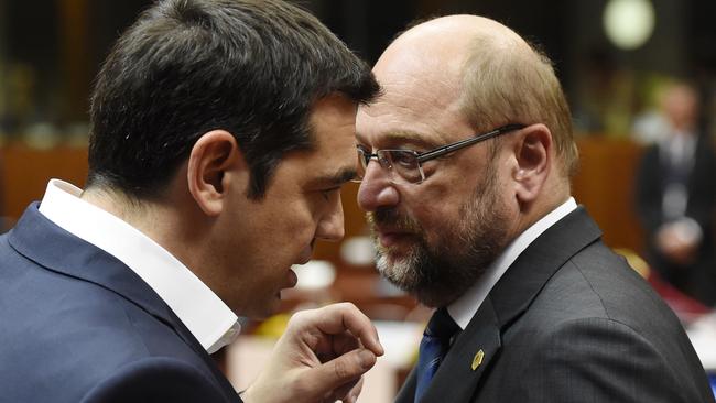 Greek PM Alexis Tsipras, left, talks with European Parliament President Martin Schulz.