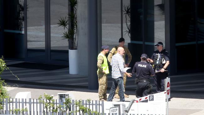 Police and Army personnel at the Ibis Hotel, as Passengers arriving into Brisbane International Airport and forced into quarantine. Passengers getting off and being taken to buses before taken to hotels to quarantine, Sunday 29th March 2020 – Photo Steve Pohlner