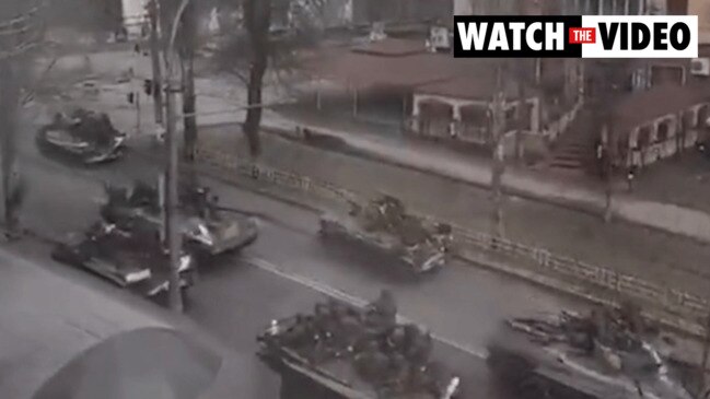 Russian military vehicles move through Kherson, Ukraine