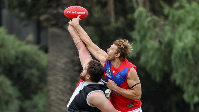 Shem Tatupu (left) in action. Picture : George Sal