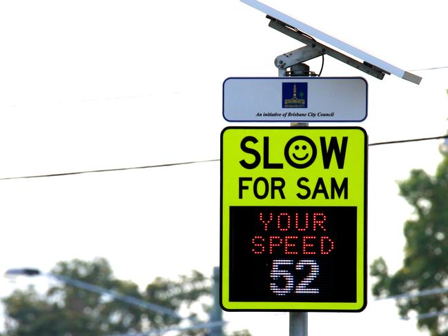 Cars driving past Slow for Sam sign on Dornoch Terrace at Highgate Hill, Highgate Hill Monday 11th November 2019 Picture AAP/David Clark