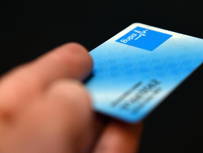 A Bupa Health Insurance membership card is displayed in Sydney on Monday, Sept. 12, 2016. (AAP Image/Paul Miller) NO ARCHIVING