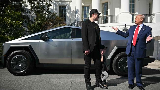 US President Donald Trump shows off Tesla cars with Elon Musk at the White House amid the EV company’s share price disaster. Picture: Mandel Ngan/AFP