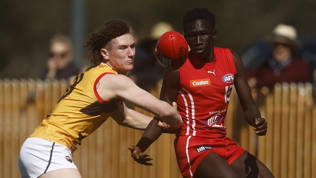 Tew Jiath (right) posted some strong results at the state draft combine. Picture: Getty Images