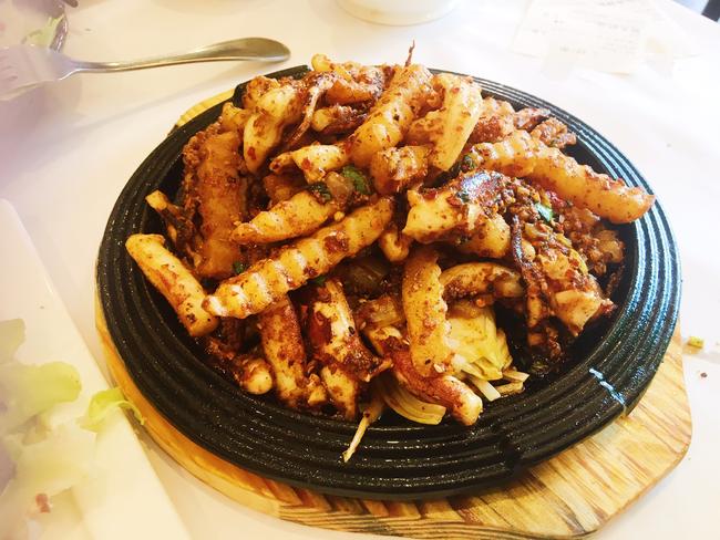 GRAZE - China Chilli, on Gouger St, Adelaide. Squid with crinkle cut chips. Picture: Dianne Mattsson.