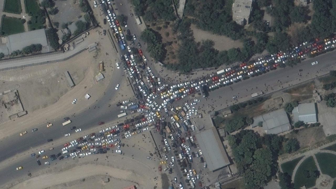 A traffic jam and crowds, during the chaotic scene at Kabul’s Hamid Karzai International Airport in Afghanistan on August 16, 2021. Picture: Maxar Technologies/AFP