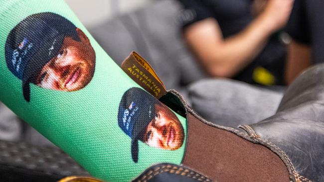 Socks with Tom Slingsby's face on them being worn by the team in Dubai.