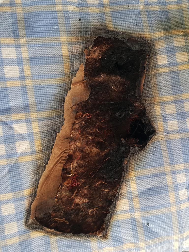 The charging device burnt a hole in the mattress. Picture: Mercury Press/Caters News