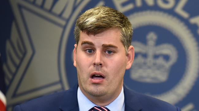 Police minister Mark Ryan with Detective acting superintendent Craig Morrow with family member (Brother) in back. Family of Kuraby murder victim Abdul Basith speak as police offer $250,000 reward. Tuesday March 3, 2018. (AAP image, John Gass)