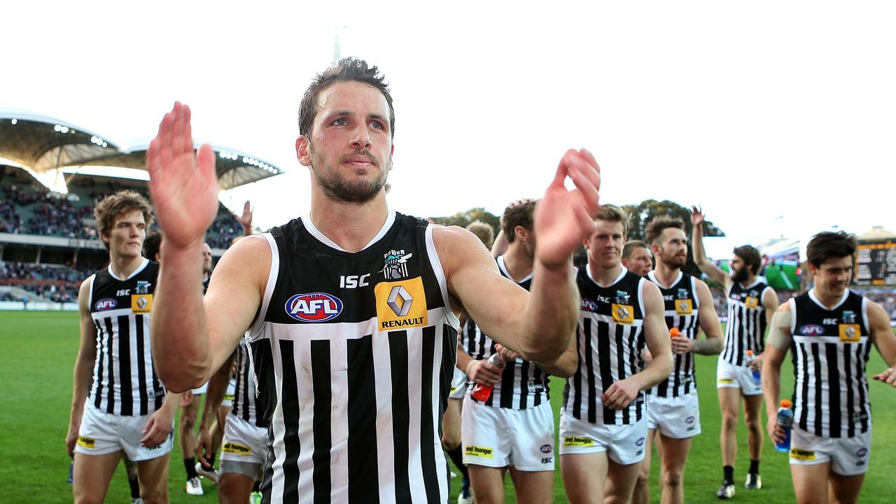 AFL Elimination Final — Port Adelaide v Richmond at Adelaide Oval. Captain Travis Boak applauds the crowd as he leads the team off. Photo Sarah Reed.
