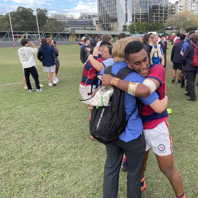 Brisbane State High School sudents and players celebrate the win.