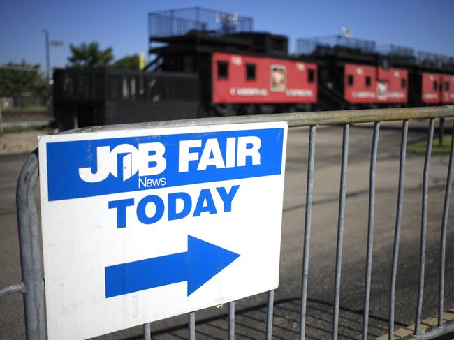 A "Job Fair" sign outside a Job News USA career fair in Louisville, Kentucky, U.S., on Wednesday, June 23, 2021. The Department of Labor is scheduled to release initial jobless claims figures on June 24. Photographer: Luke Sharrett/Bloomberg