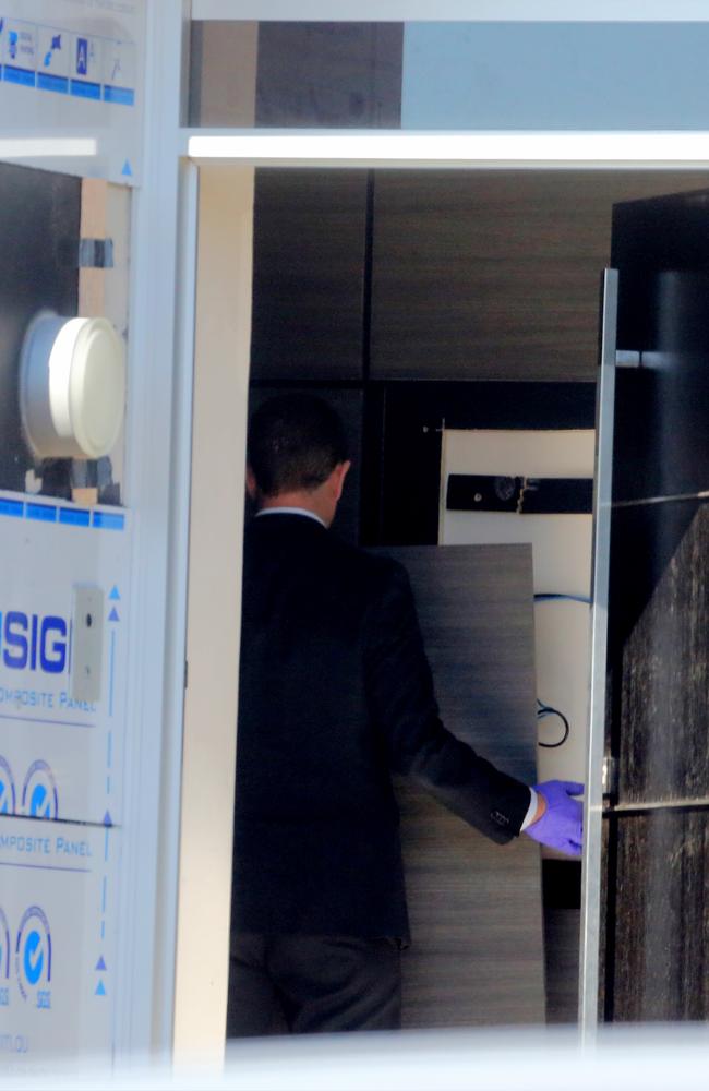 Police remove roof panels from the eastern suburbs home of Fadi Ibrahim. Picture: John Grainger