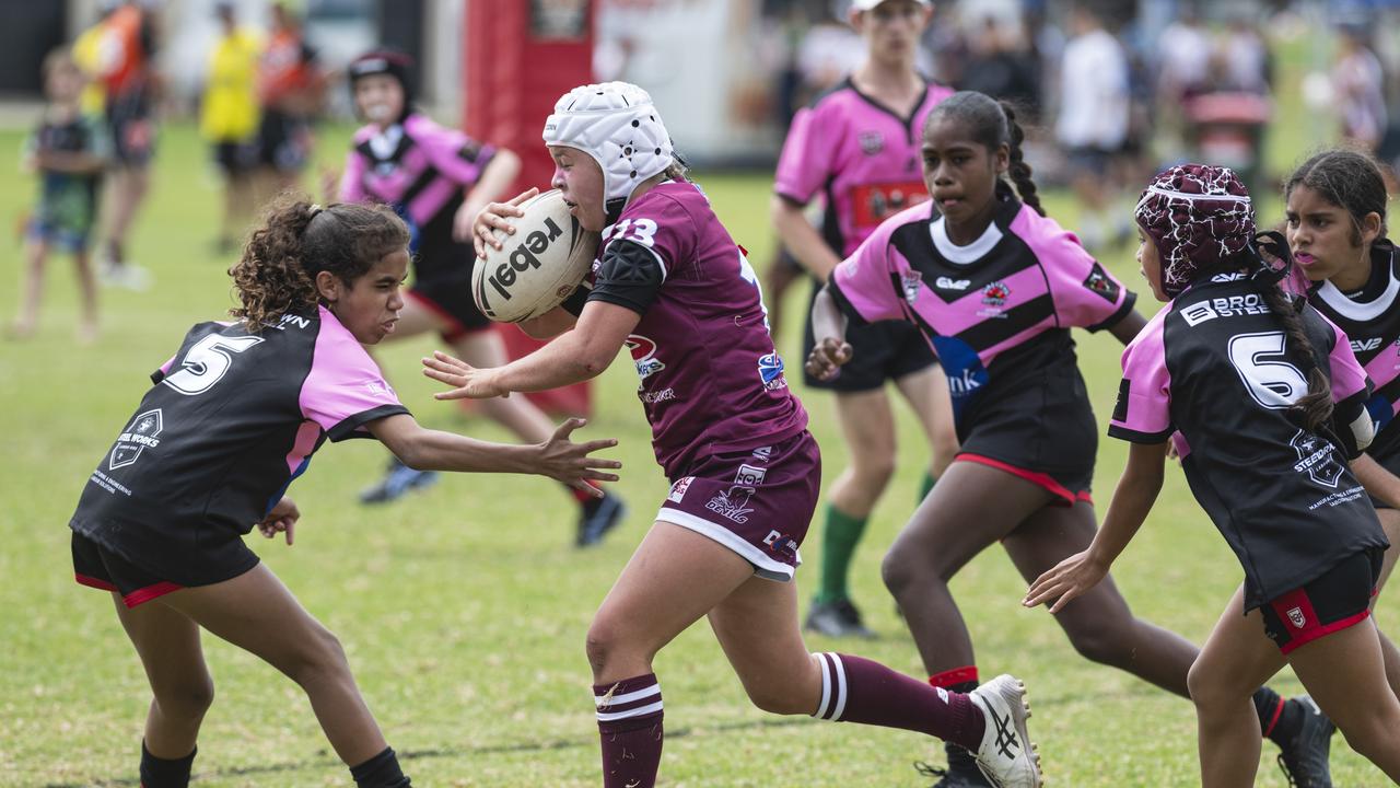 Nevaeh Horswood of Dalby charges Jaylah Weatherall of Valleys. Picture: Kevin Farmer