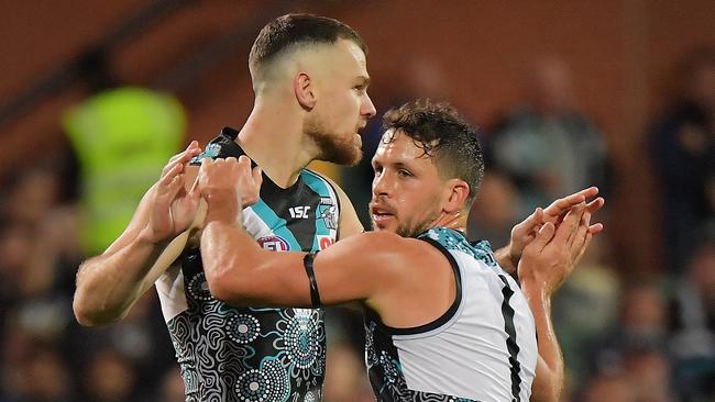 Robbie Gray celebrates a goal with Travis Boak. Picture: Getty Images