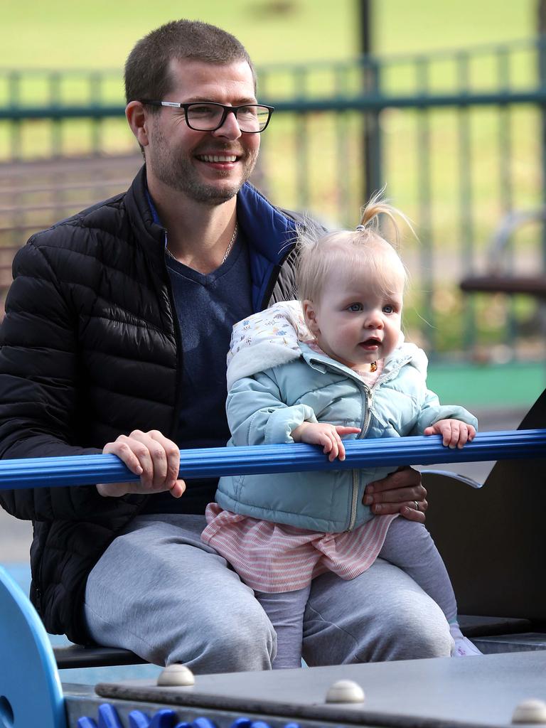 Sydney's playgrounds reopened today, just in time for Gabrielle's 1st birthday, pictured with father Luc at Rushcutters Bay, Sydney. Picture: Matrix Media