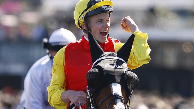 James McDonald celebrates winning the Darley Classic on Delectation.