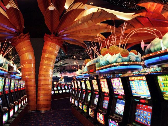 PIRATE: Gaming room lined with poker machines at Pyrmont's Star City Casino 10/11/97.NSW / Gambling / Interior / Machine