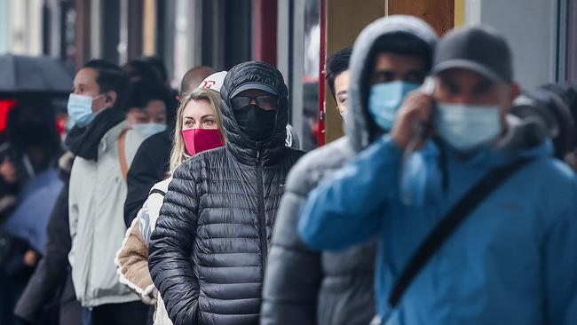 MELBOURNE: AUSTRALIA- NewsWire Photos 19 JULY 2021: People line up for coronavirus tests in Russell St. Melbourne as the state of Victoria continues its lockdown due to a Covid-19 cluster spread from NSW to Melbourne. Picture: NCA NewsWire / Ian Currie