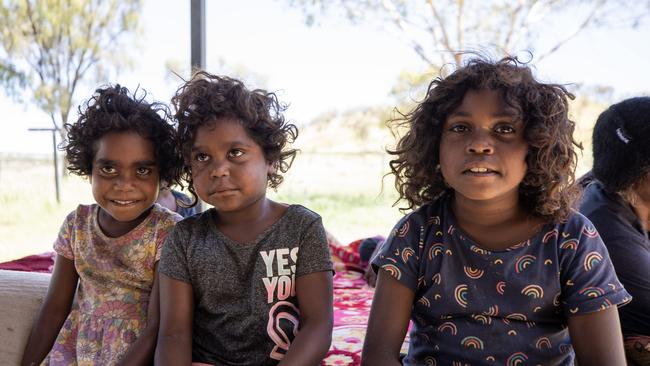 Tilana, aged 5, Janine, aged 4 and Monica, aged 8 pictured at a home in a town camp on the outskirts of Alice Springs. Picture: Liam Mendes