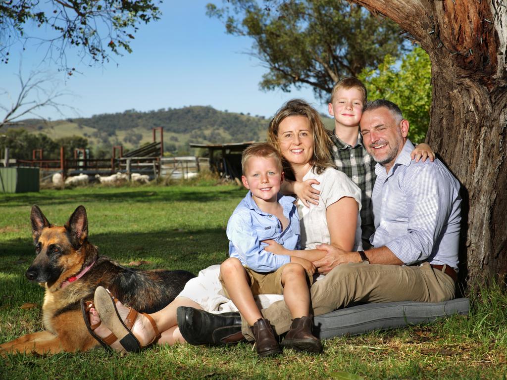 Sally-Anne and Ray Kearns pictured on their property with their boys Alex – 6yo and Ashton – 4yo (and dog Athena) made the "tree change" country lifestyle move to property at Cullenbone near Mudgee. Picture by Dean Marzolla