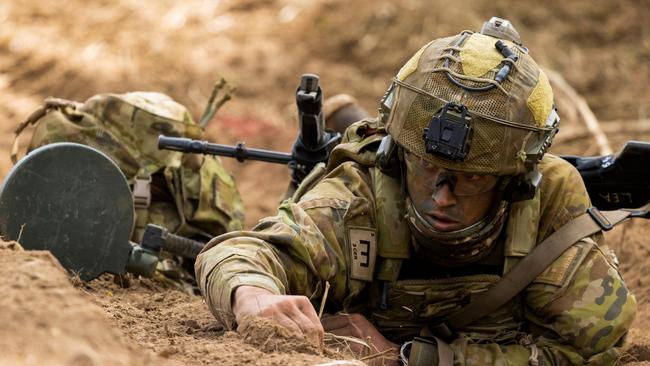 Regional tensions will require additional defence spending, including increasing the effective size of the army. Picture: News Corp