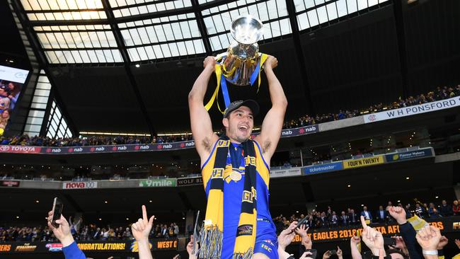 West Coast’s Jeremy McGovern holds the premiership trophy after winning during the 2018 AFL Grand Final. Picture: Julian Smith/AAP