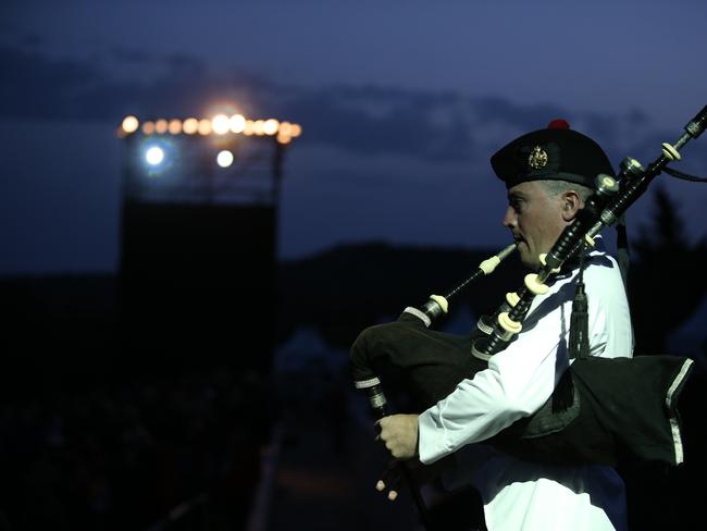 A bagpiper performs during the Dawn Service ceremony at the Anzac Cove beach. Picture: AP 