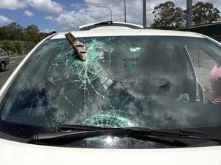 CLOSE CALL: A number plate pierced a woman's windscreen. Picture: Queensland Police Service