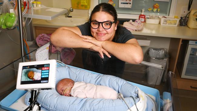 Jane Schwartz with her daughter Amara, who was born on the 12th of February, just under 12 weeks early, using the new Baby Cam technology at Townsville University Hospital. Picture: Shae Beplate.