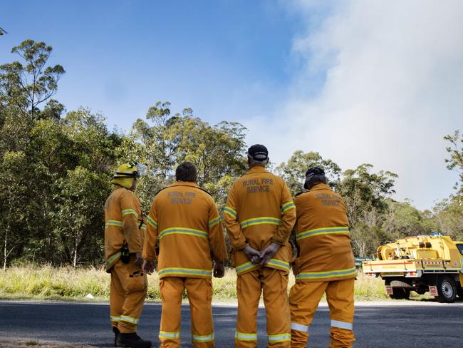 Emergency services work to contain a bushfire at Beerwah on Sunday afternoon. Picture: Lachie Millard