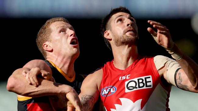 Reilly O’Brien (left) would have been hoping to bounce back against Port. Picture: James Elsby/AFL Photos via Getty Images