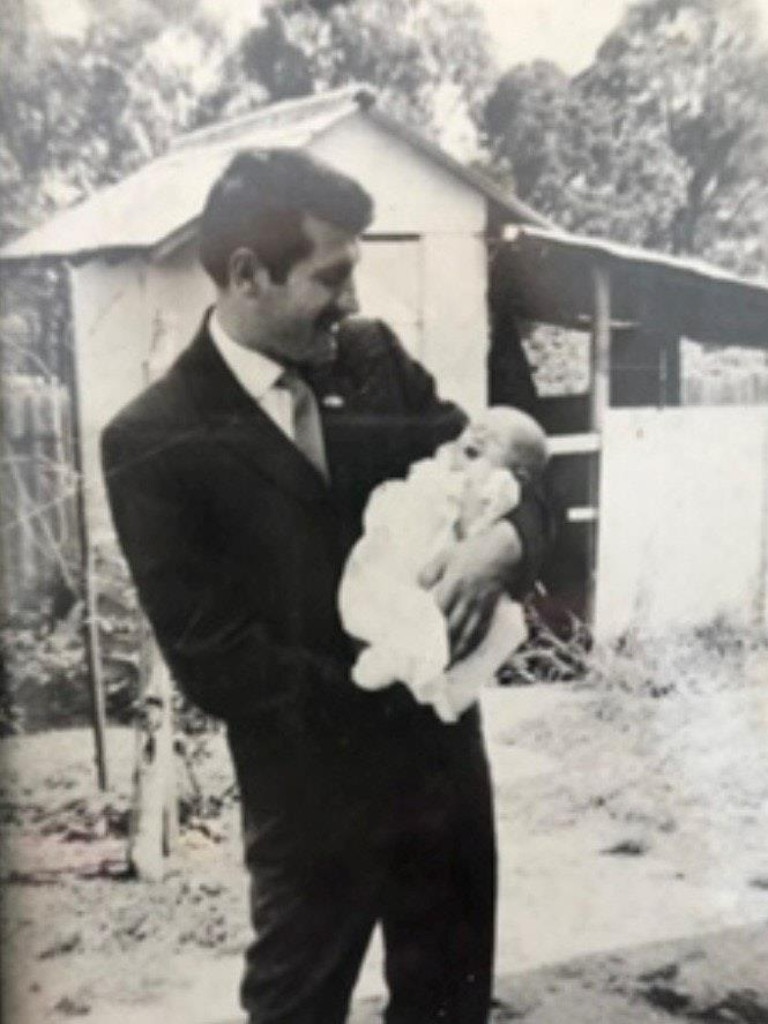 Mr Djordjevic with one of his children. Picture: NSW Police