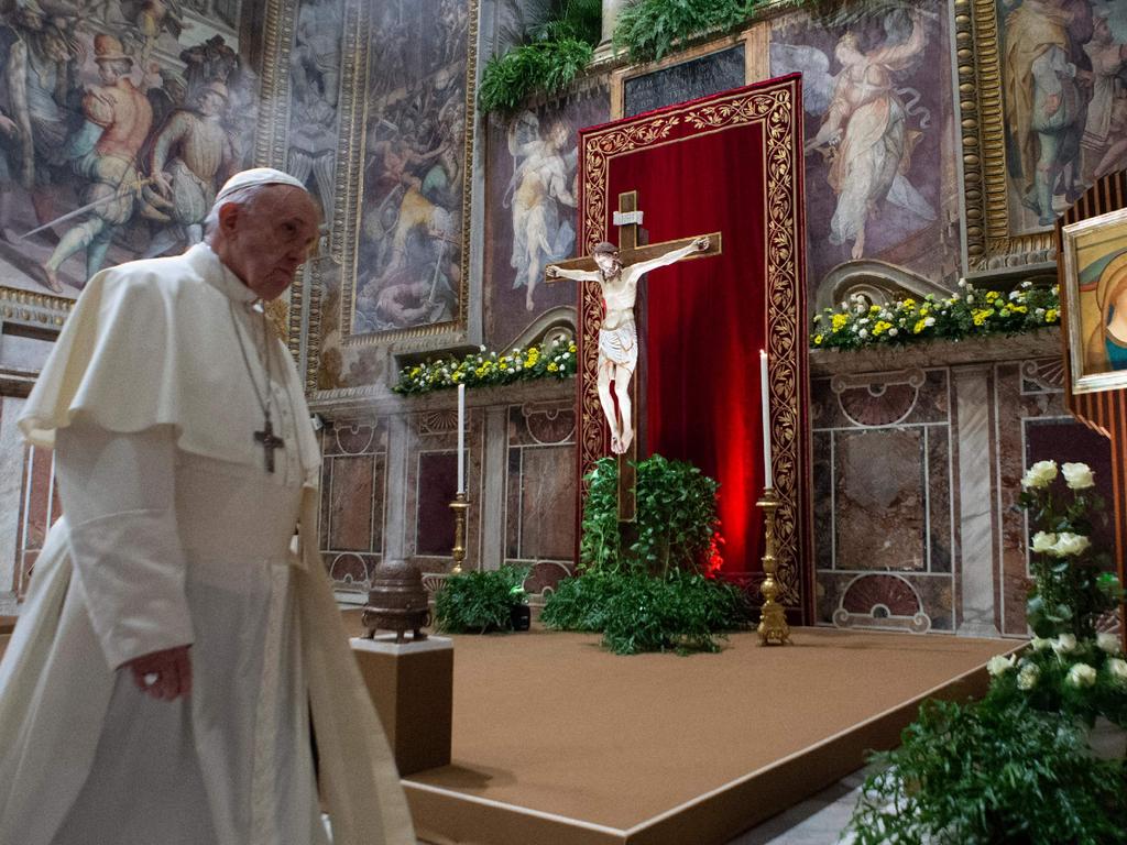 Pope Francis walking during Eucharistic celebration at the Regia Hall. Picture: AFP