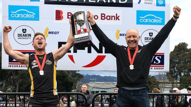 EFNL 2024: Balwyn captain Charlie Haley and coach Brenton Sanderson hold the Premier Division cup aloft. Picture: Davis Harrigan