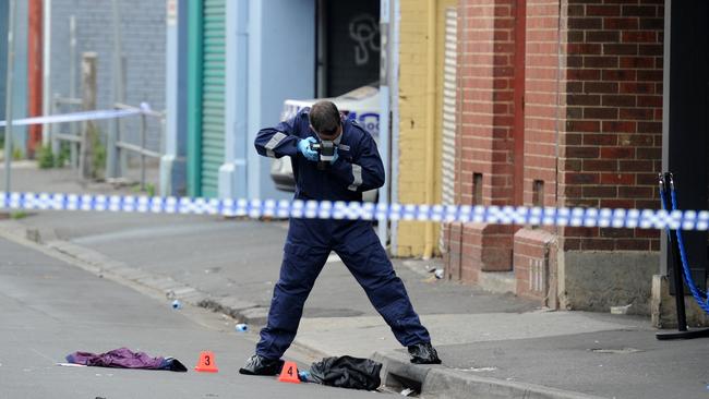 Police at the scene outside Love Machine nightclub in Prahran. Picture: Andrew Henshaw