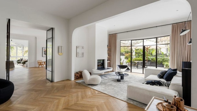 Parquet flooring adds a touch of class throughout much of the home’s ground level.