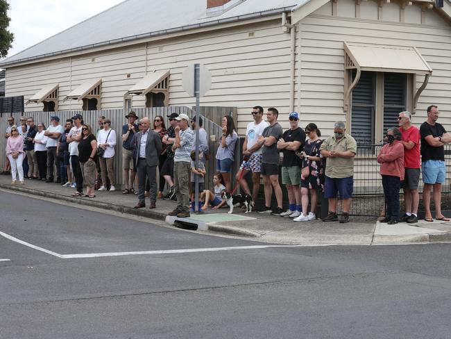 A crowd gathers for an auction at 9 Elizabeth St in Geelong West, Victoria, on Saturday. Picture: Mike Dugdale