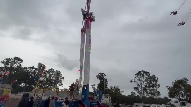 Show goers brave the highest of rides.