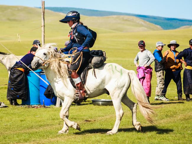 Dumplings and feral horses: Qld rider finishes world’s longest race