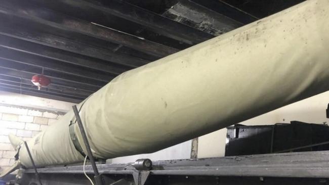 An undated image released by the IDF purportedly show a Hezbollah missile system in the attic of a home in the southern Lebanon village of Houmine al-Tahta. Picture: IDF