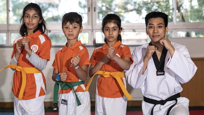 Izzah Jasim, 9, Josiah Smith, 7, Amayra Sikarwar, 7, and Danny Taing, 1st Dan at Inspire Carlingford. Picture: NCA NewsWire/ Monique Harmer