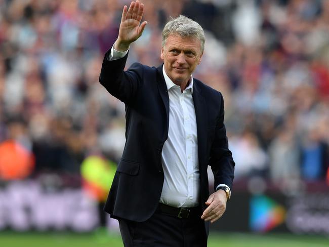 West Ham United's Scottish manager David Moyes waves to supporters on the pitch after the English Premier League football match between West Ham United and Everton at The London Stadium, in east London on May 13, 2018. West Ham won the game 3-1. / AFP PHOTO / Ben STANSALL / RESTRICTED TO EDITORIAL USE. No use with unauthorized audio, video, data, fixture lists, club/league logos or 'live' services. Online in-match use limited to 75 images, no video emulation. No use in betting, games or single club/league/player publications.  /