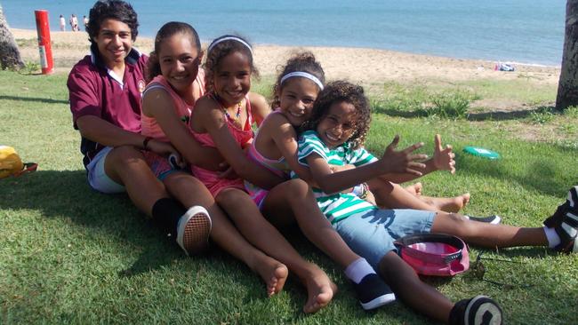 The Fowler siblings. From left, Quivi, Ciara, Mary, Louise and Seamus at Trinity Beach in Cairns.